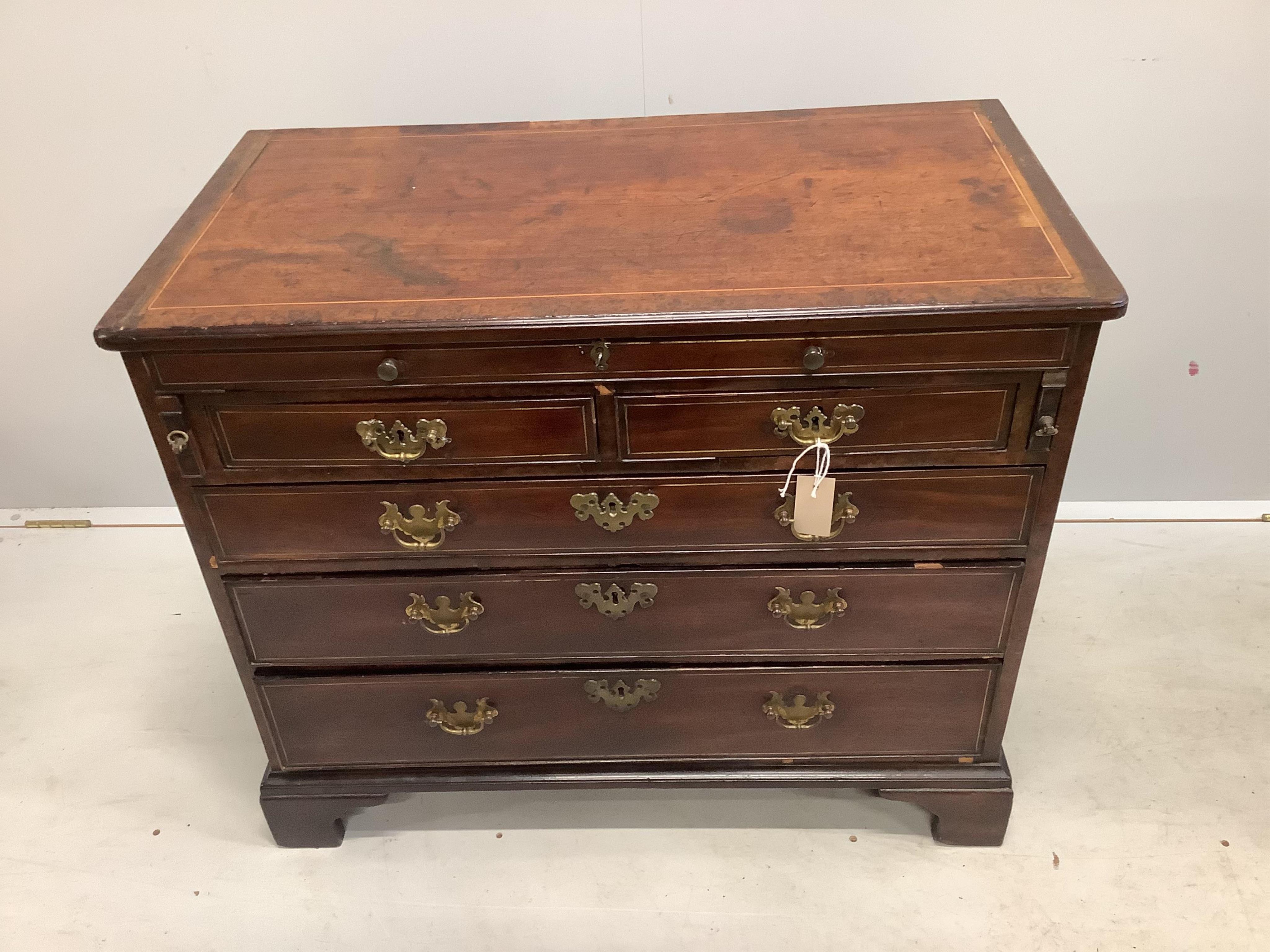 A George III, possibly padouk, brass inlay,dressing chest in the manner of John Channon, width 88cm, depth 47cm, height 74cm. Condition - fair